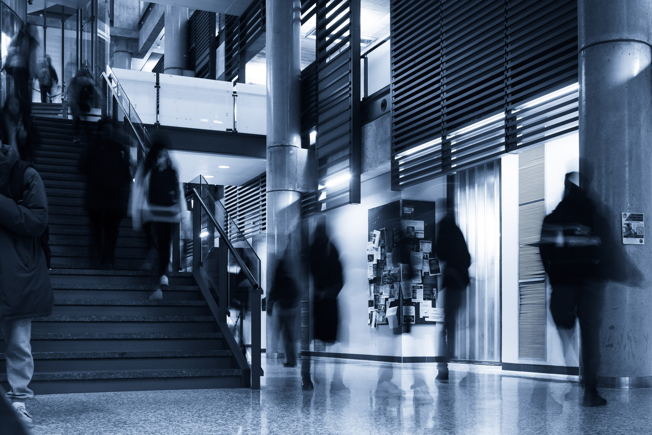 Students pass through the Bahen Centre for Information Technology between classes.