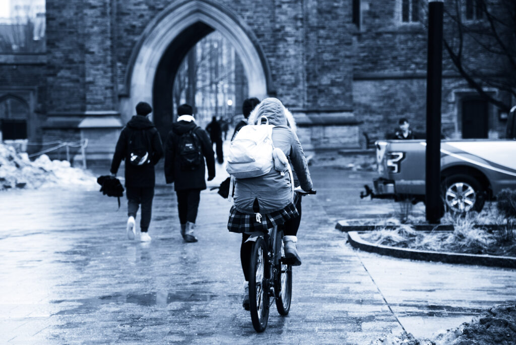 Students move across campus during a foggy afternoon on Feb. 9, 2023.